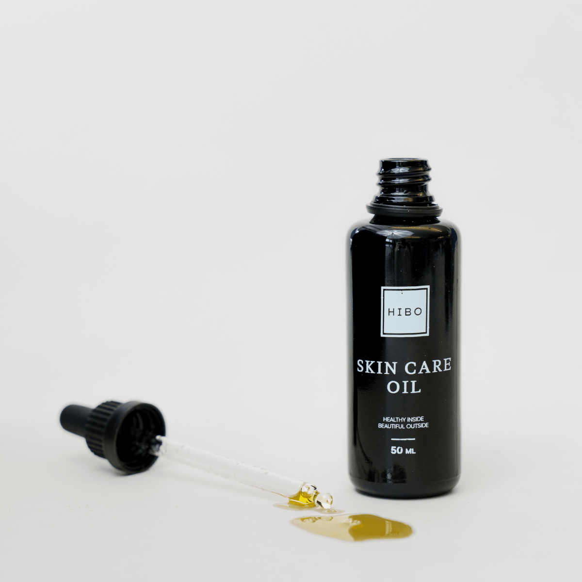 Skin Care Oil - packaging + CBD oil pipette